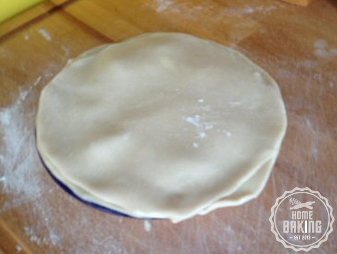 place the pastry lid on top of the pie